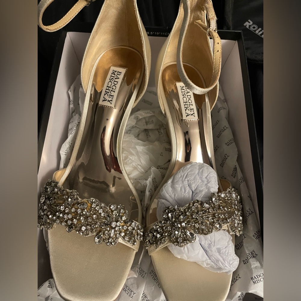 Off white / cream satin heels size 8.5 these would fit someone wear a 7.5 or a 8